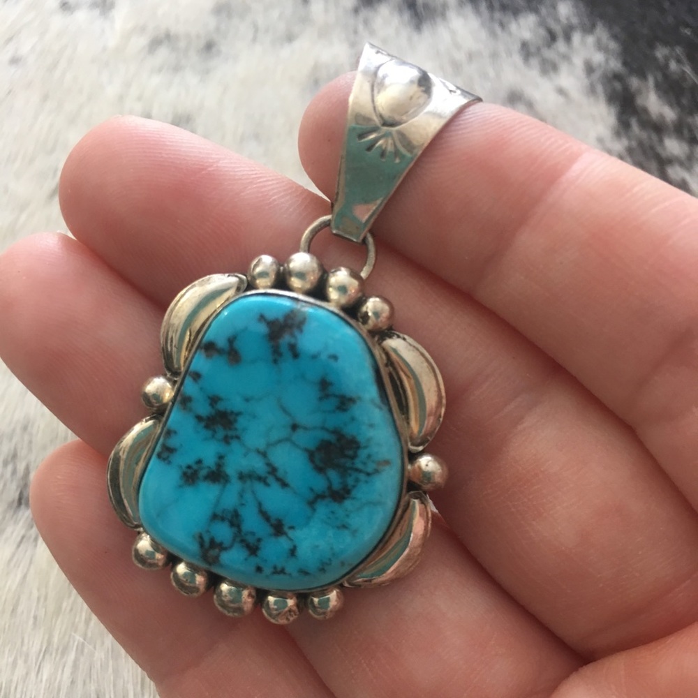 Sleeping beauty and sterling pendant